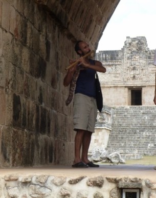Flute player amongst the Mayan Ruins of Uxmal - Mexico