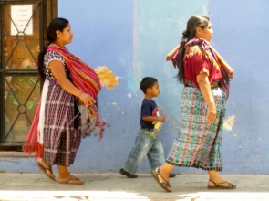 In step -Street vendors and boy - Antigua,Guatemala