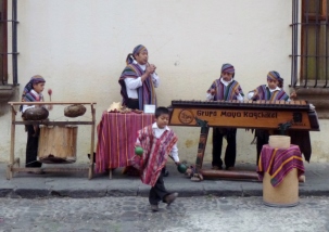 Street performers and a marimba band - Antigua,Guatemala