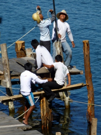 Building a dock - driving pile in at Lake Atitilan,Guatemala