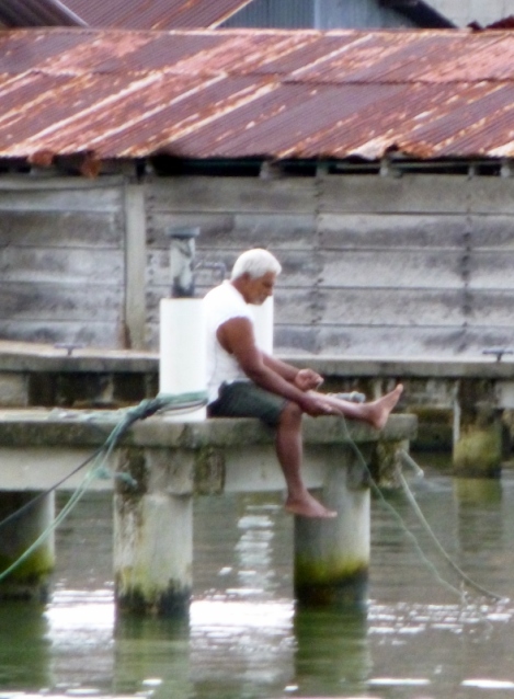 A fisherman with hand line - Livingston,Guatemala
